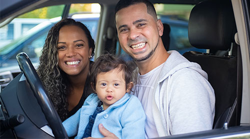 Happy family inside the car photo